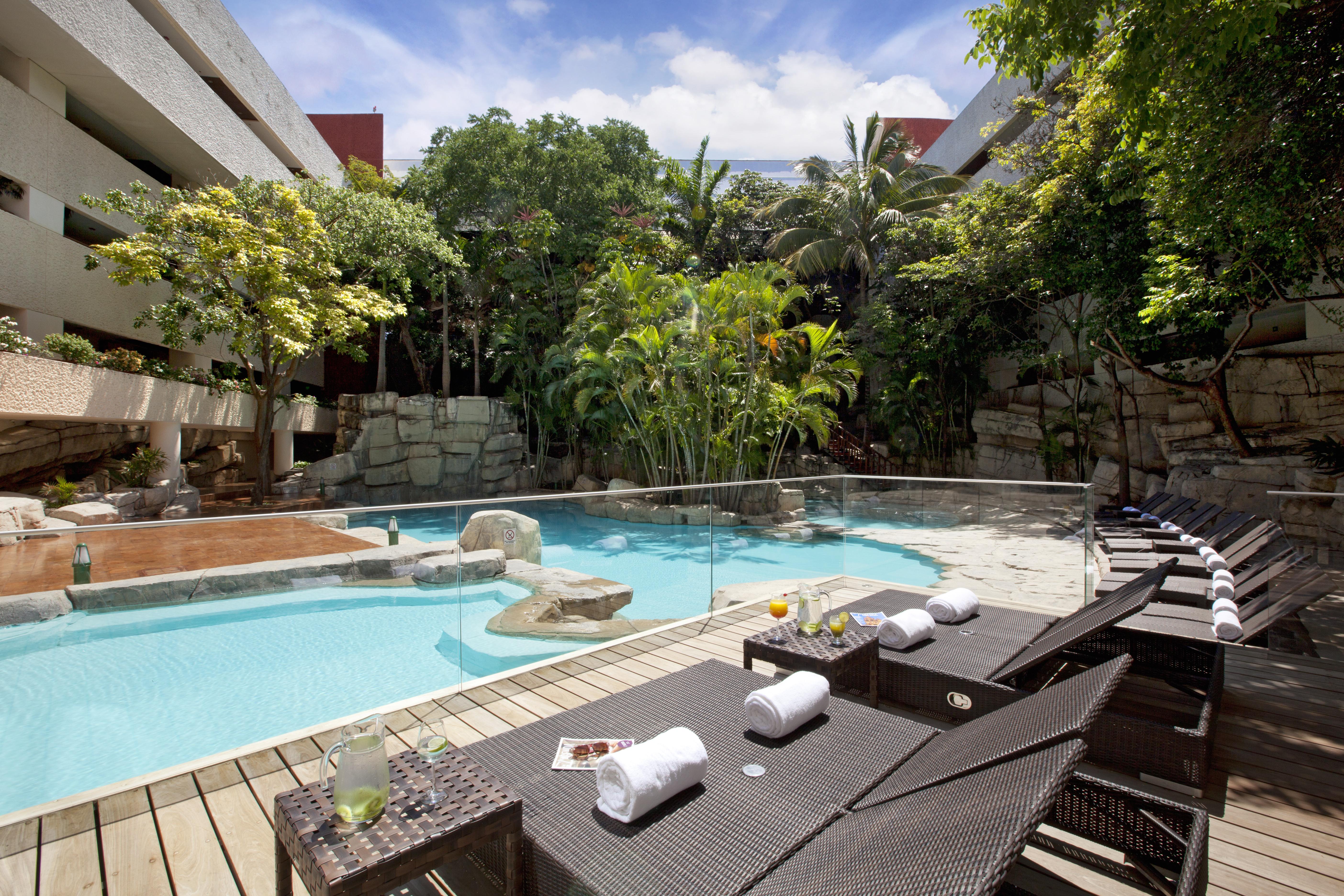 Marriott Tuxtla Gutierrez Hotel Εξωτερικό φωτογραφία The pool at the hotel